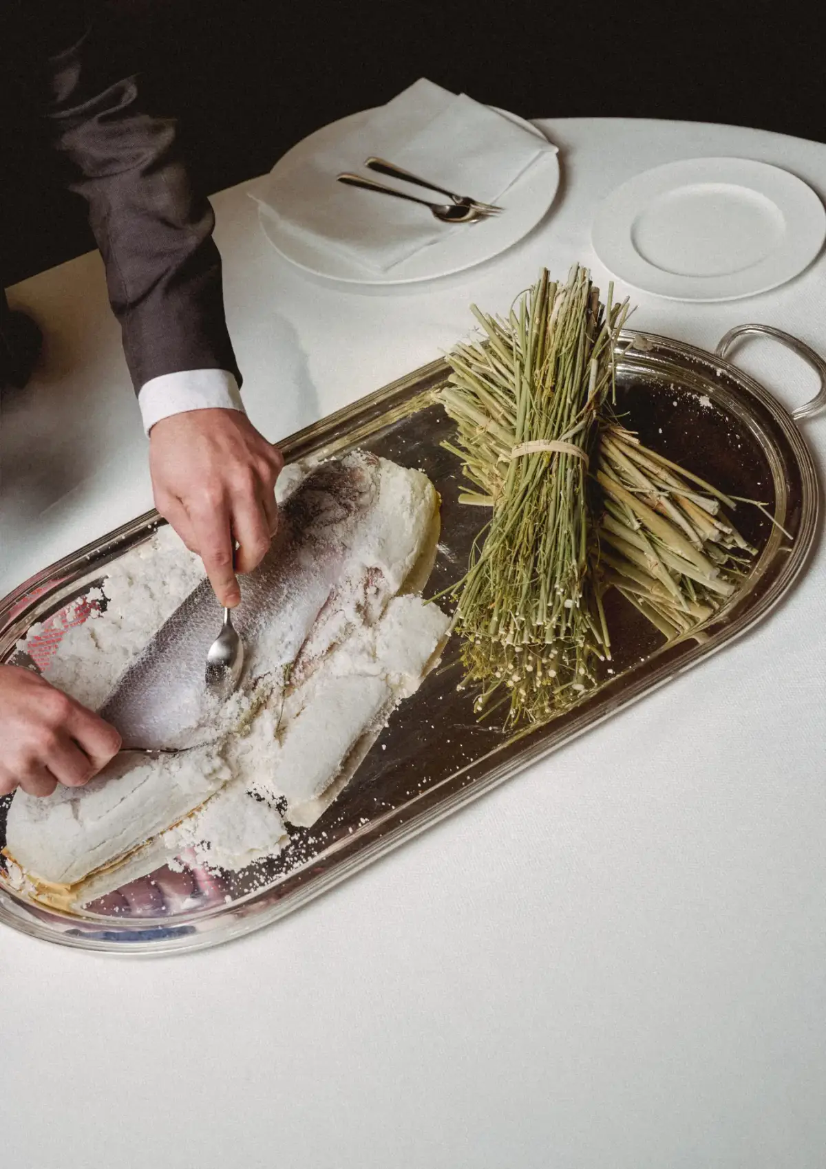 Salt-crusted fish preparation